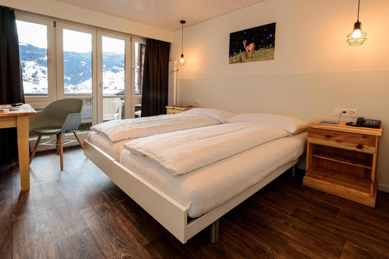 Jungfrau Lodge, Swiss Mountain Hotel Гриндельвальд Экстерьер фото